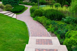 Outdoor granite steps and pathway around landscape